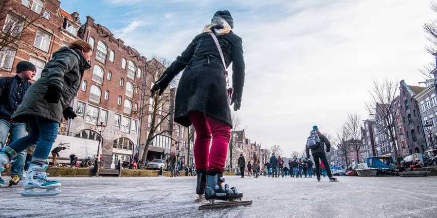 Colourful canal parade during Amsterdam Pride